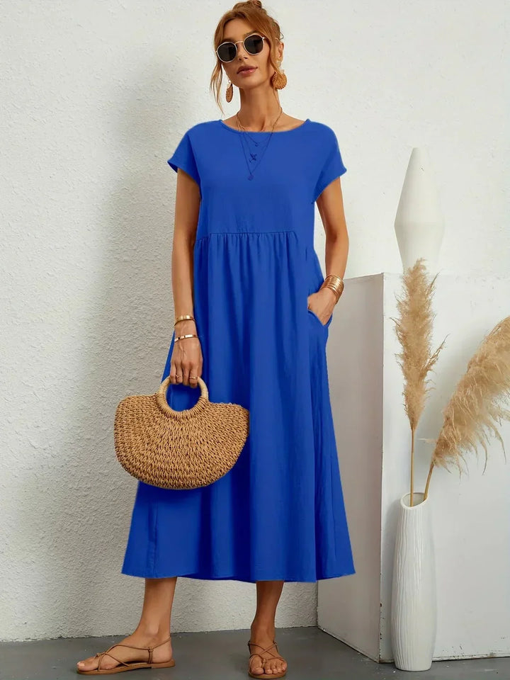 Lucyna - Midi sukienka w płynnej elegancji ponadczasowej
