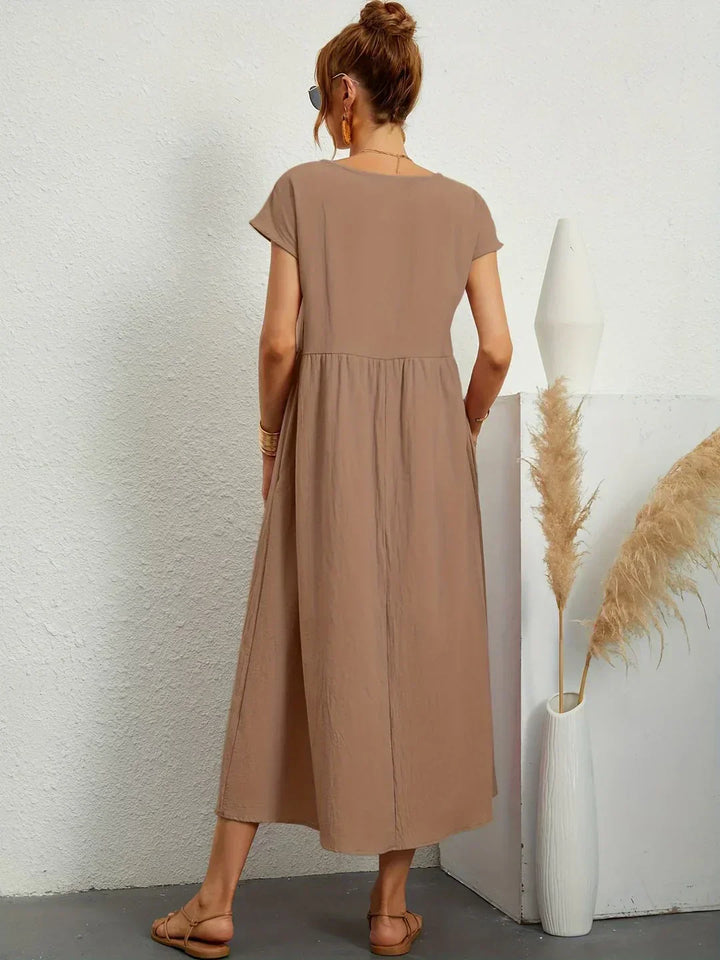 Lucyna - Midi sukienka w płynnej elegancji ponadczasowej