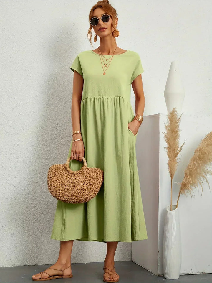Lucyna - Midi sukienka w płynnej elegancji ponadczasowej