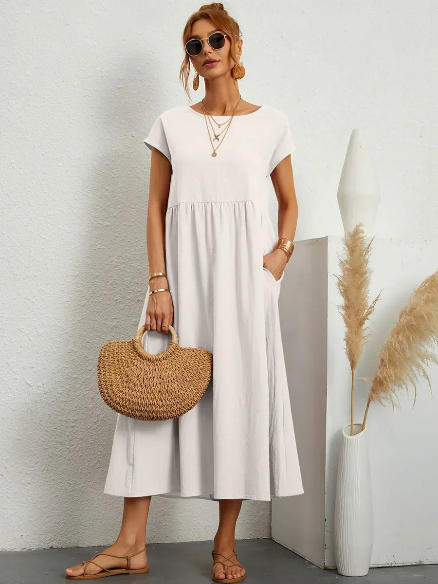 Lucyna - Midi sukienka w płynnej elegancji ponadczasowej